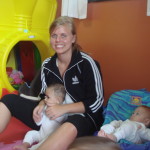 Educational-Center-Volunteer-and-babies-150x150-1.jpg
